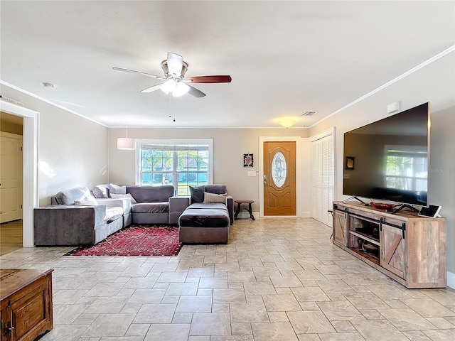 living room with crown molding and ceiling fan