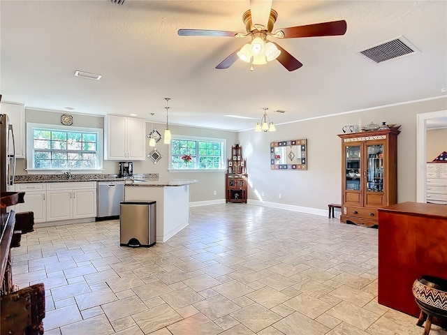 kitchen featuring white cabinetry, dishwasher, decorative light fixtures, crown molding, and ceiling fan