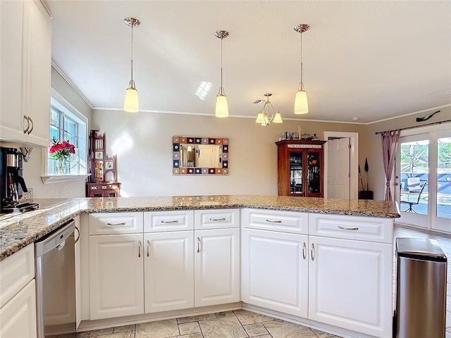 kitchen featuring stainless steel dishwasher, white cabinets, and hanging light fixtures