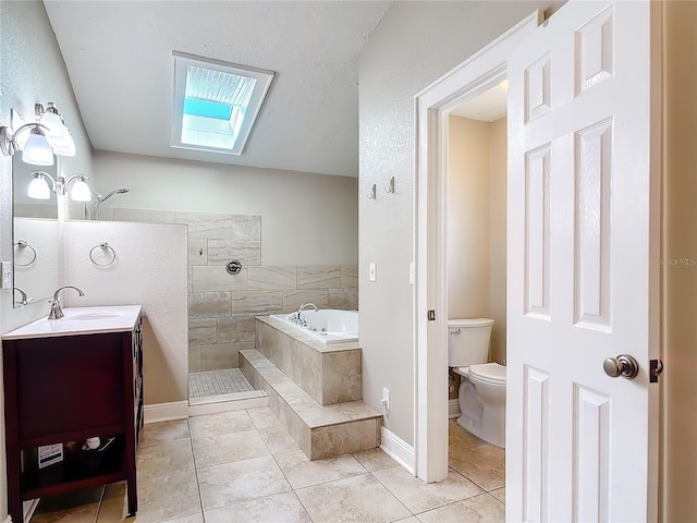 full bathroom featuring vanity, plus walk in shower, a skylight, toilet, and tile patterned floors