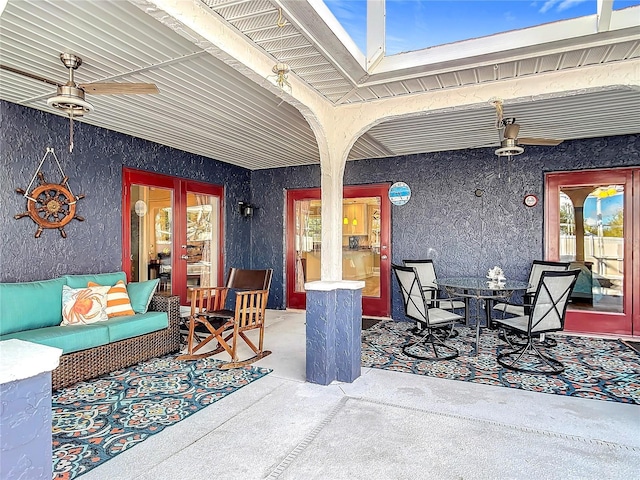 view of patio / terrace with french doors, outdoor lounge area, and ceiling fan