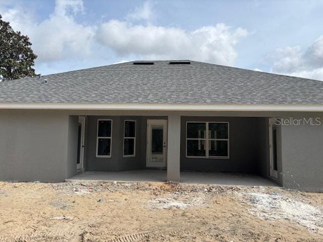 rear view of property with a patio