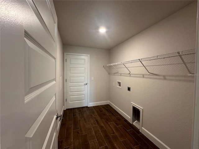 laundry room featuring washer hookup, dark hardwood / wood-style floors, and electric dryer hookup