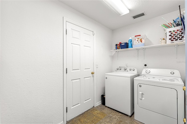 laundry area with washer and clothes dryer