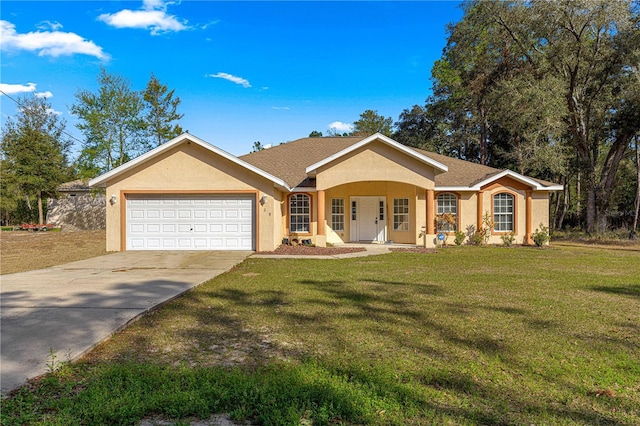 single story home with a garage and a front lawn