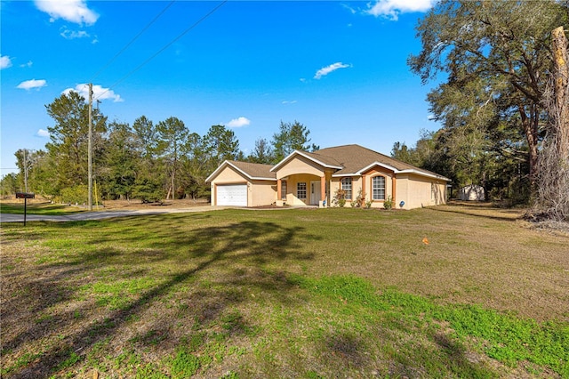 ranch-style house with a garage and a front lawn