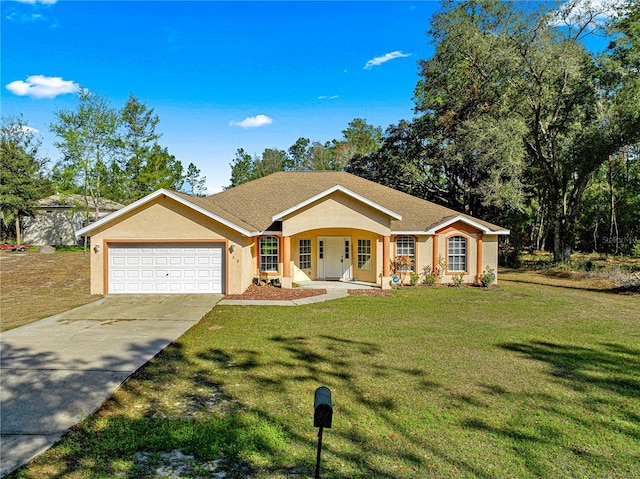 ranch-style home with a garage, a front yard, and covered porch