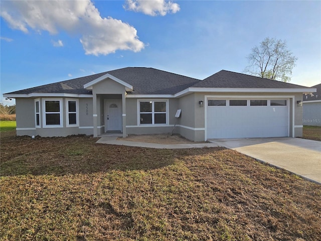 single story home featuring driveway, stucco siding, roof with shingles, an attached garage, and a front yard