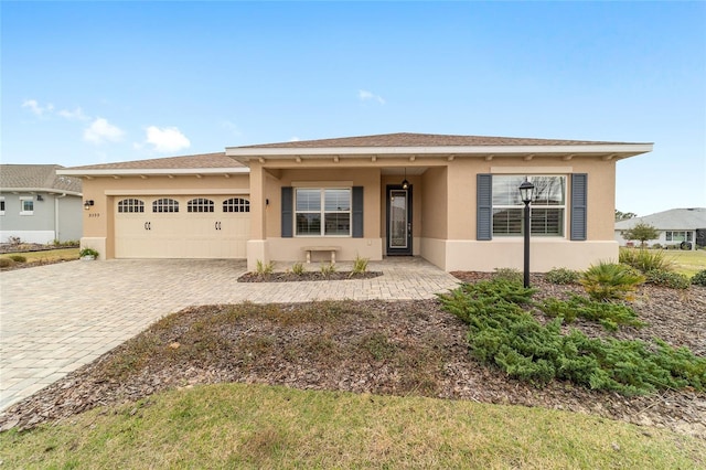 view of front of property with a garage