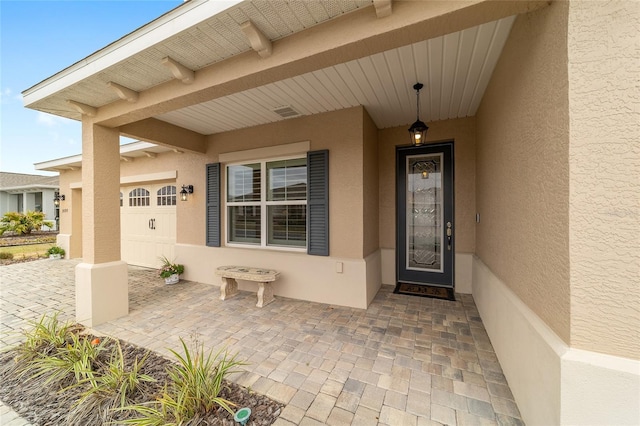 entrance to property with a garage