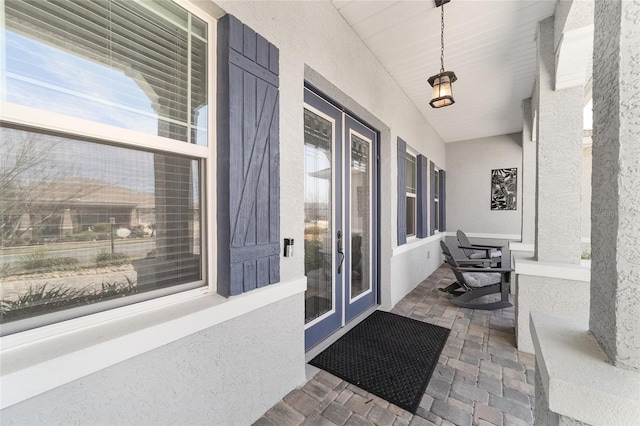 entrance to property featuring a porch