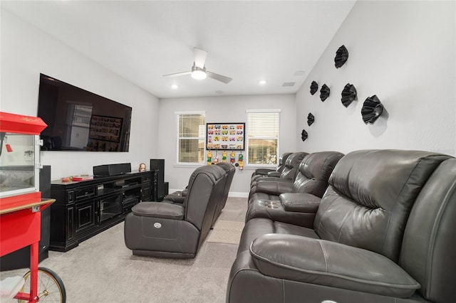 carpeted living room featuring ceiling fan