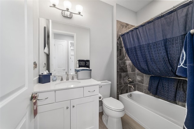 full bathroom with shower / tub combo with curtain, vanity, hardwood / wood-style flooring, and toilet