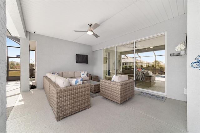 interior space featuring ceiling fan, outdoor lounge area, and a lanai