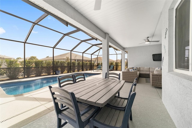 view of patio / terrace featuring outdoor lounge area, ceiling fan, and glass enclosure