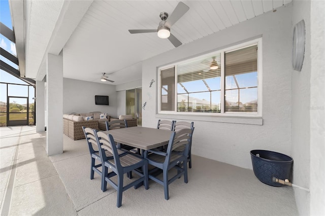 dining space featuring ceiling fan