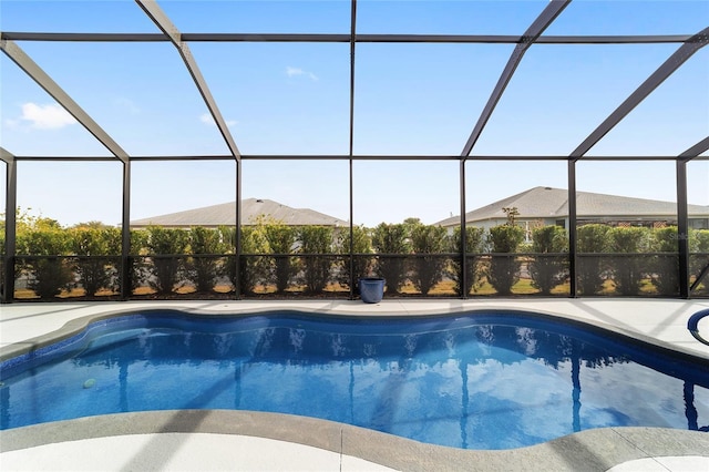 view of pool with a lanai