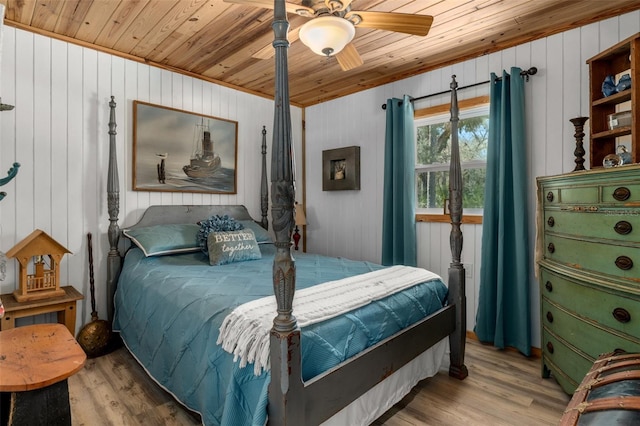 bedroom featuring ceiling fan, wooden ceiling, and light hardwood / wood-style floors