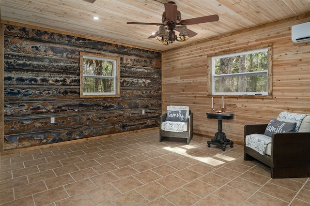 sitting room with ceiling fan, tile patterned flooring, wooden ceiling, an AC wall unit, and wood walls