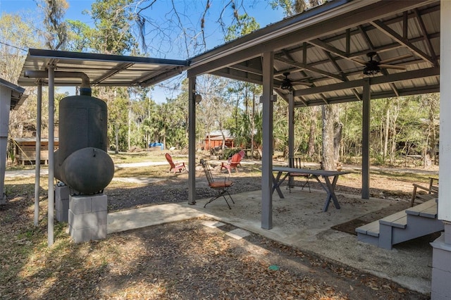 surrounding community featuring a patio