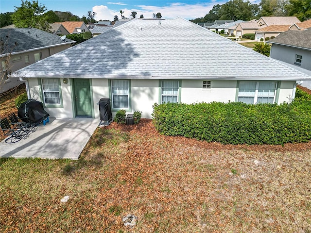 rear view of property with a patio area