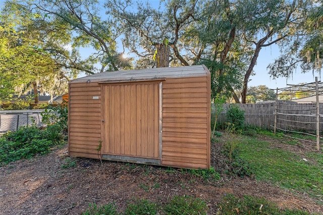 view of shed featuring a fenced backyard