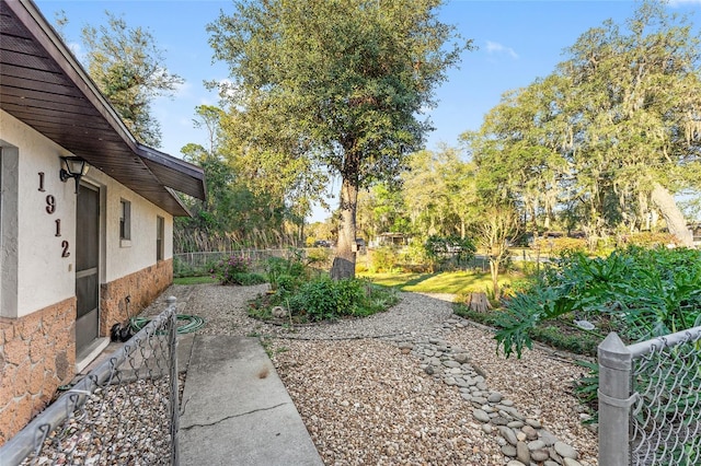 view of yard with fence