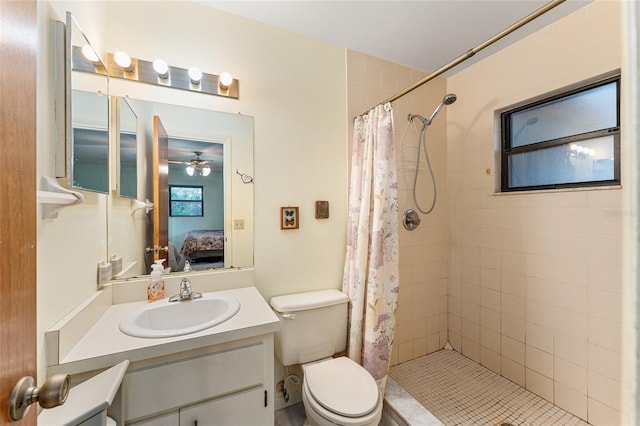 ensuite bathroom with toilet, a shower stall, ensuite bath, and vanity