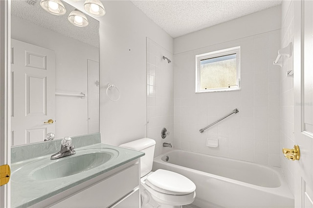 bathroom with vanity, toilet, tub / shower combination, and a textured ceiling