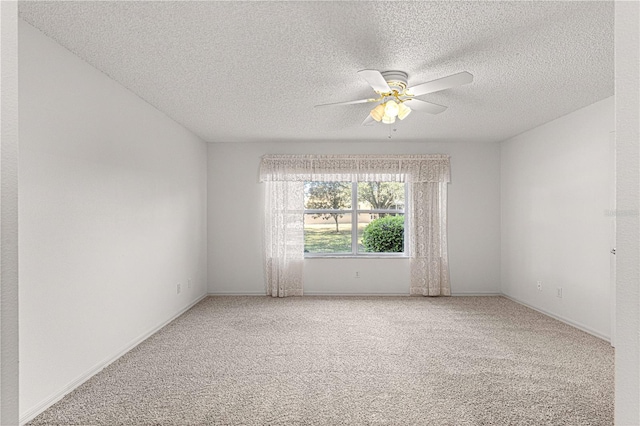 unfurnished room with baseboards, carpet floors, a textured ceiling, and ceiling fan