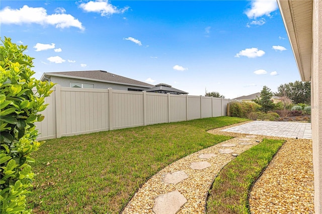 view of yard with a patio area