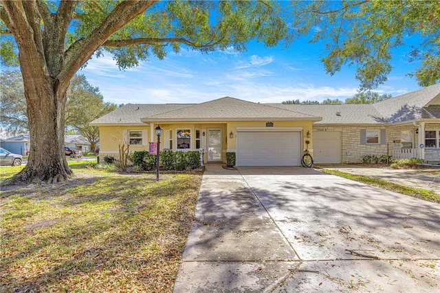 ranch-style home with a garage