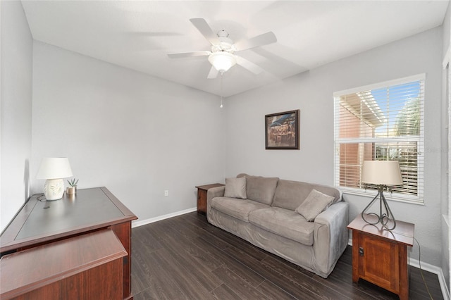 living room with ceiling fan and dark wood-type flooring