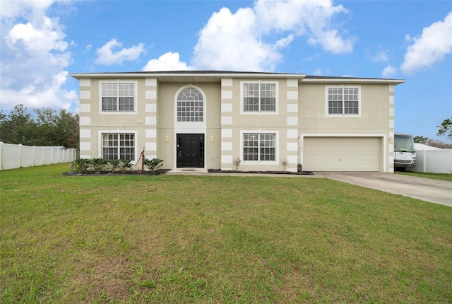 view of front of property featuring a front yard, fence, and driveway