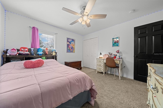 bedroom featuring a closet, light carpet, ceiling fan, and baseboards