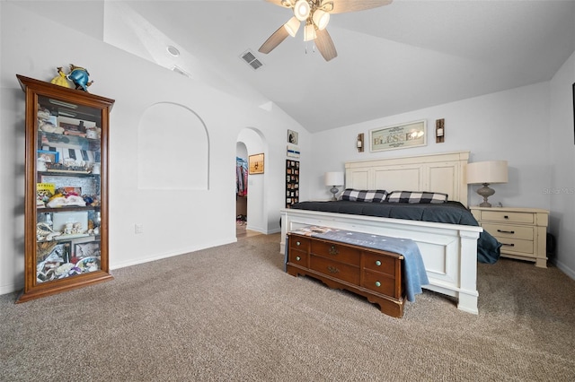 carpeted bedroom featuring baseboards, visible vents, arched walkways, a ceiling fan, and lofted ceiling