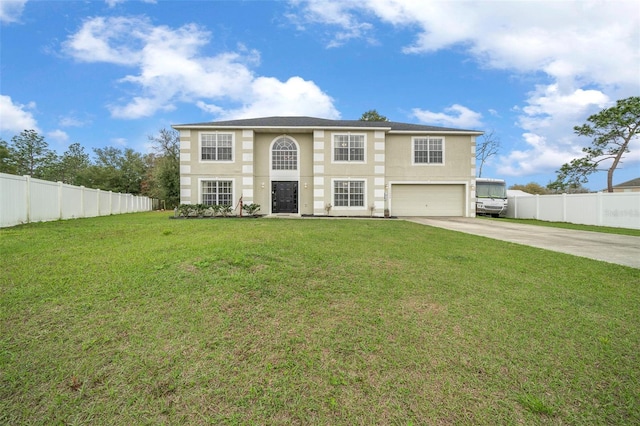 view of front of home featuring driveway, a front yard, and fence