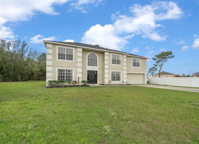 view of front of house with a garage, concrete driveway, fence, a front yard, and stucco siding