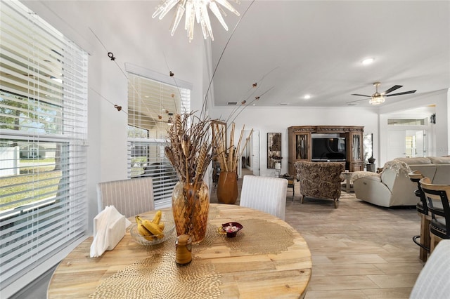 dining area with a ceiling fan, recessed lighting, and light wood finished floors