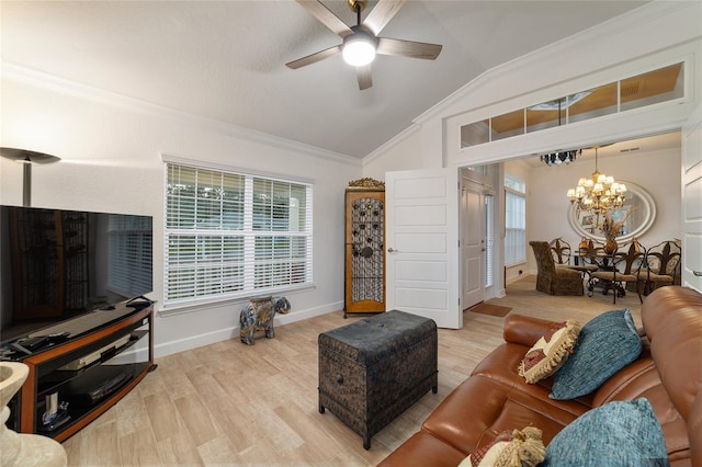 living area with lofted ceiling, ornamental molding, wood finished floors, baseboards, and ceiling fan with notable chandelier