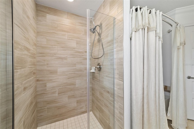 bathroom featuring a shower stall