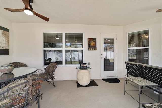 interior space with ceiling fan and outdoor dining space