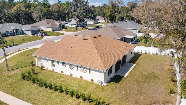 drone / aerial view with a residential view