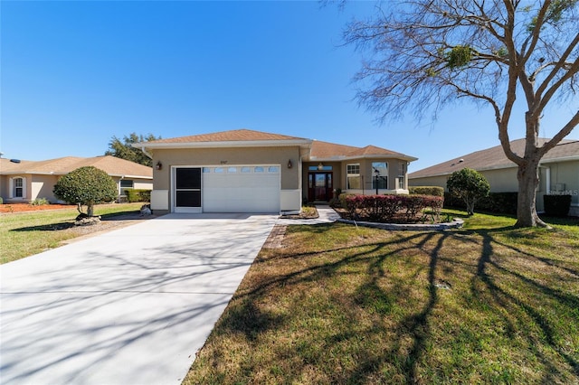 view of front of house with a front lawn and a garage