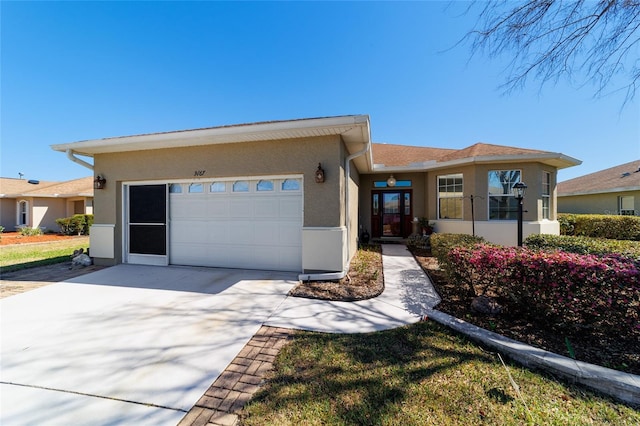 view of front of property with a garage