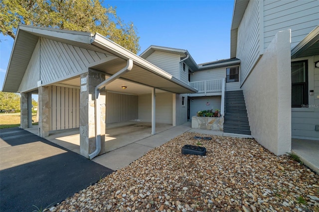 exterior space with a carport