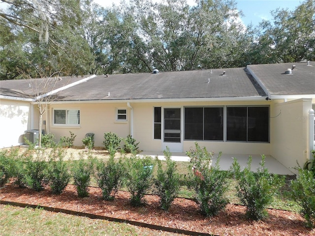 back of property featuring a patio area and cooling unit