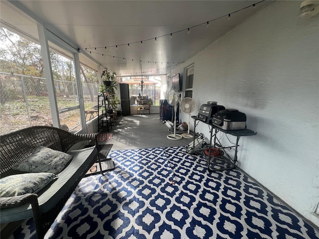 sunroom / solarium featuring a healthy amount of sunlight