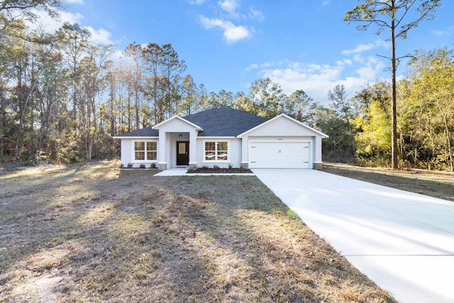 ranch-style house featuring a garage