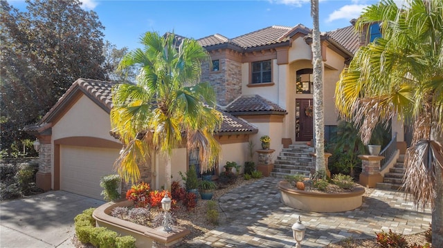 mediterranean / spanish-style house featuring a garage